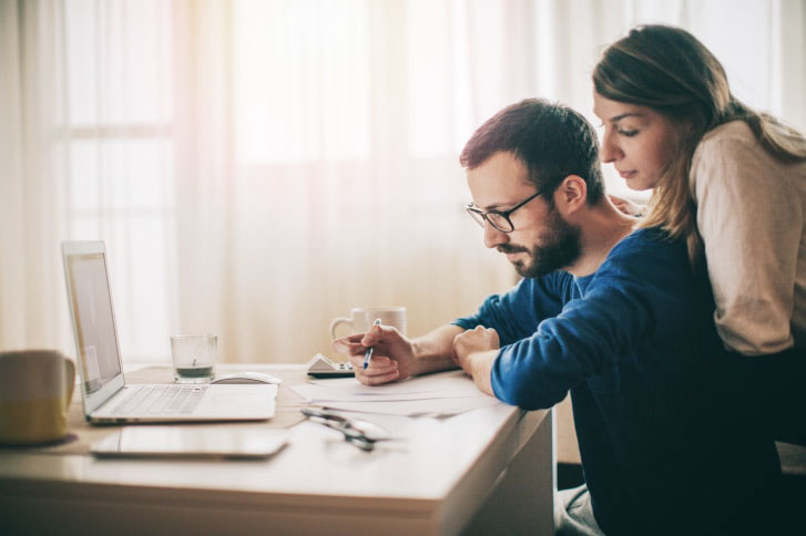 couple looking at finances together