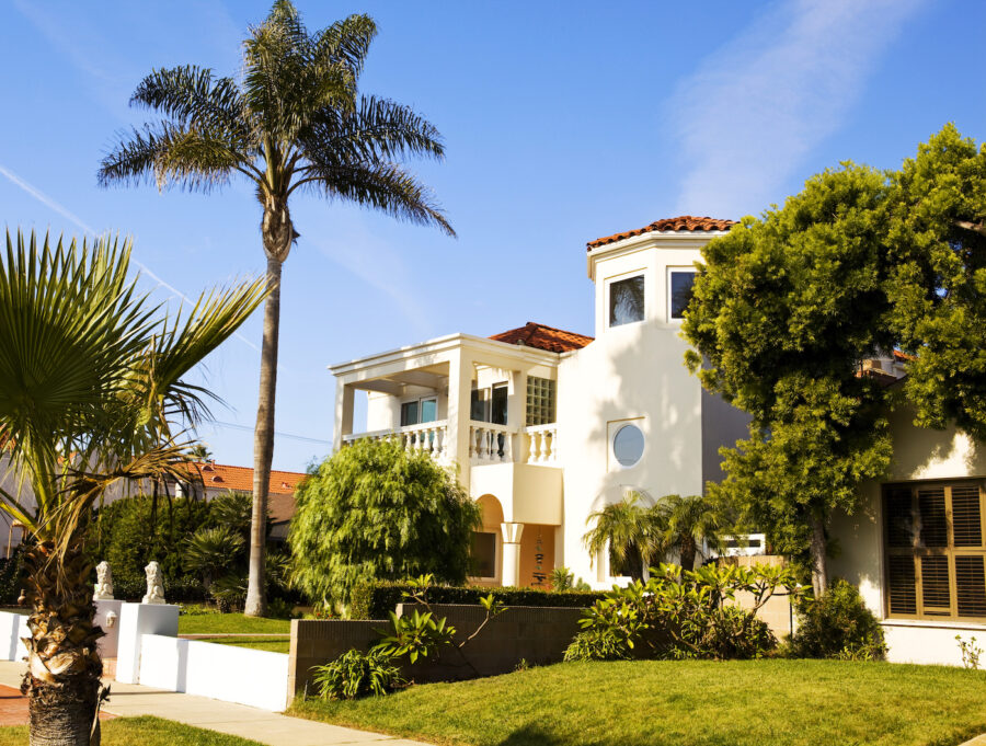 Front yard view of a beautiful mission-style residential house in Redondo Beach, Southern California