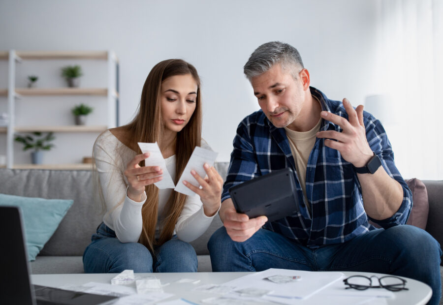 Couple going over finances and examining debt