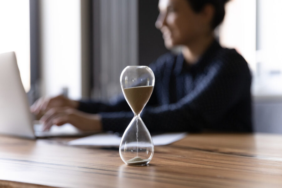 hourglass-timer-woman-working