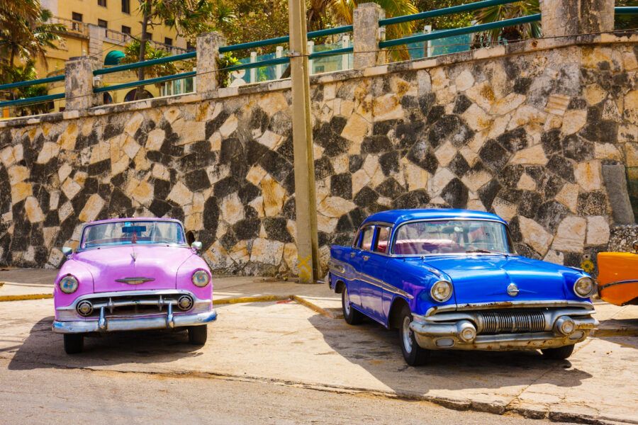 Two vintage cars in Havana Vedado, Cuba