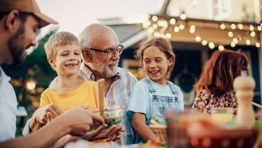 Grandfather with his grandkids on a family gathering